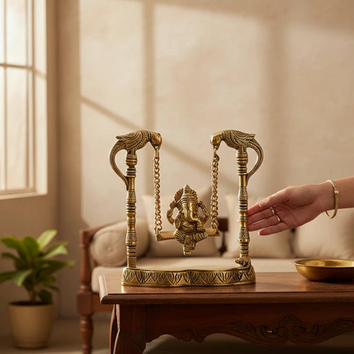Brass Ganesha on Swing with Peacocks